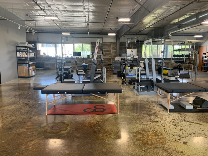 Open adjusting area at Precision Chiropractic ATX