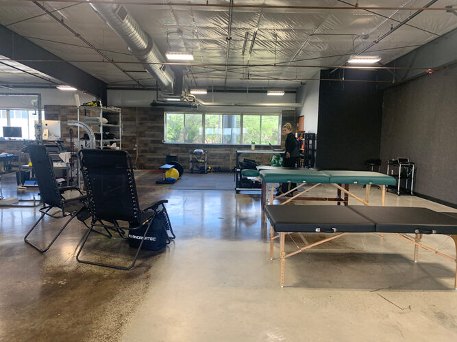 Treatment space with adjusting tables and natural light